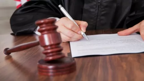 About to appear in court? Book a text message reminder for the day...